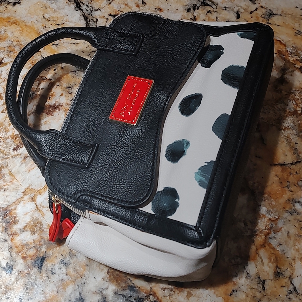 Betsey Johnson mini bag 8.5" by 6.5". Black n off white. Man made materials cute